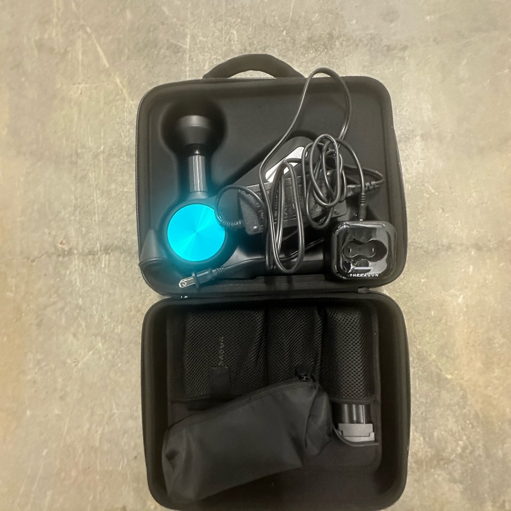 Massage device THERAGUN